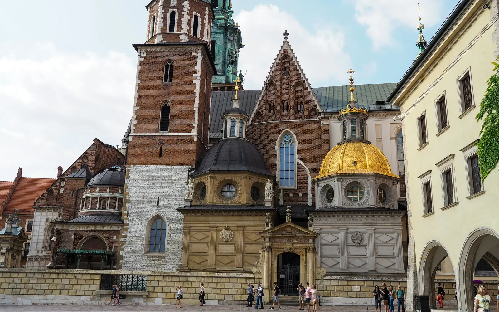 The golden domes and chapels of Wawel Cathedral beside the castle